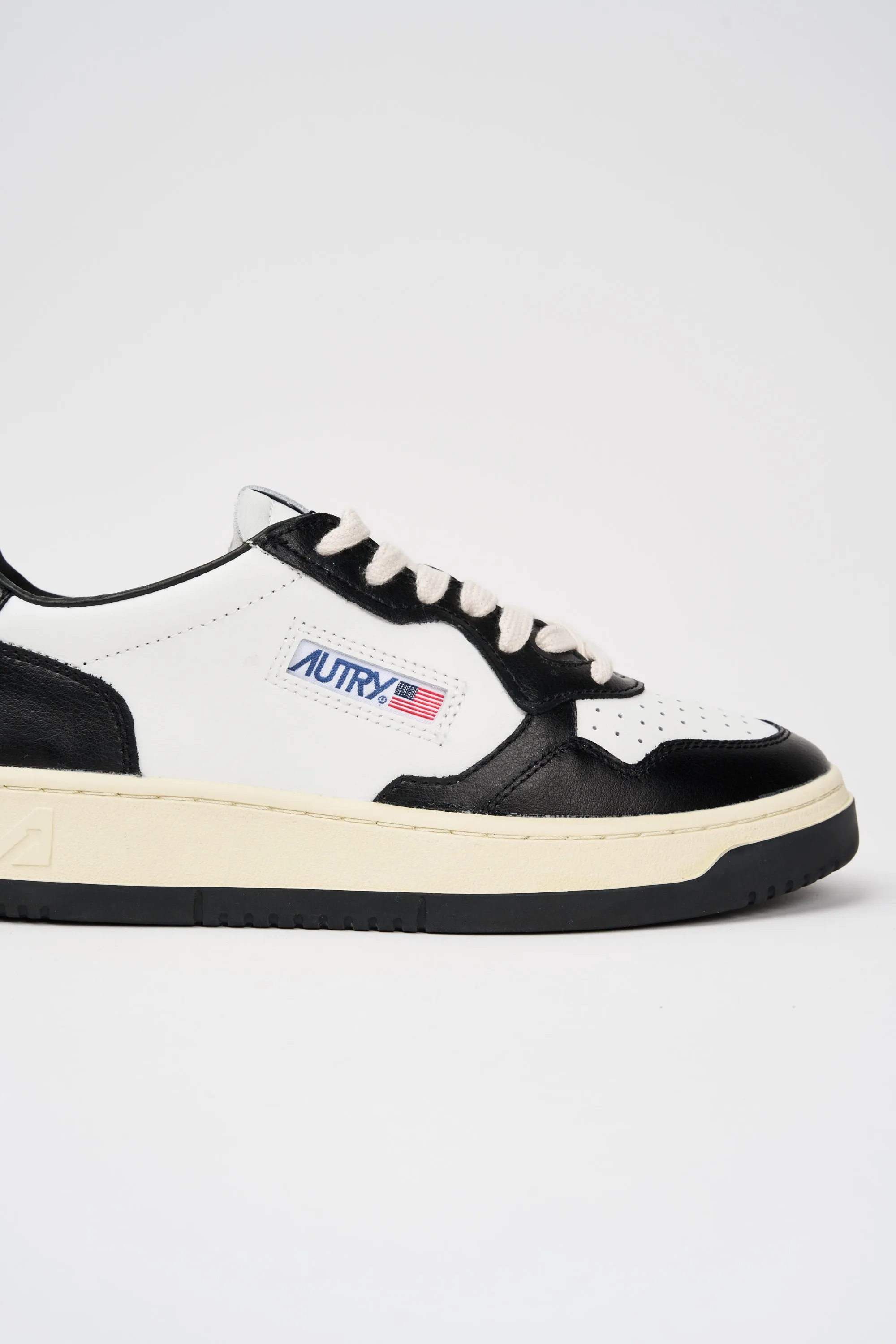 Autry Sneakers in Pelle Bicolor Bianco Nero 4044